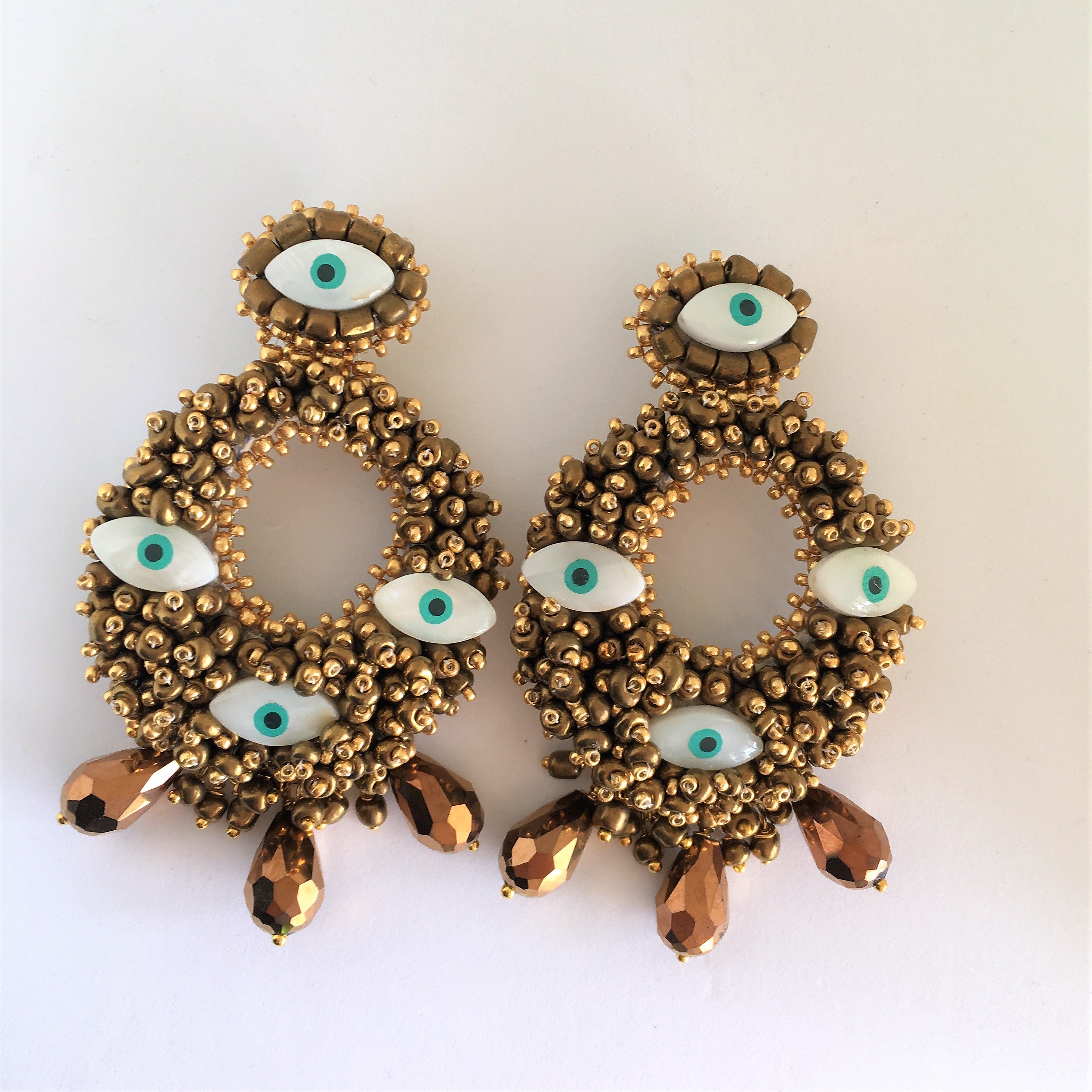 rock + bone handmade statement earrings Alegra Evil Eyes
